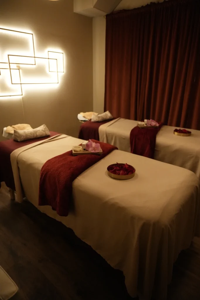 Clean and comfortable massage beds in tranquil couples massage room at Luxsa Thai Spa Manhattan