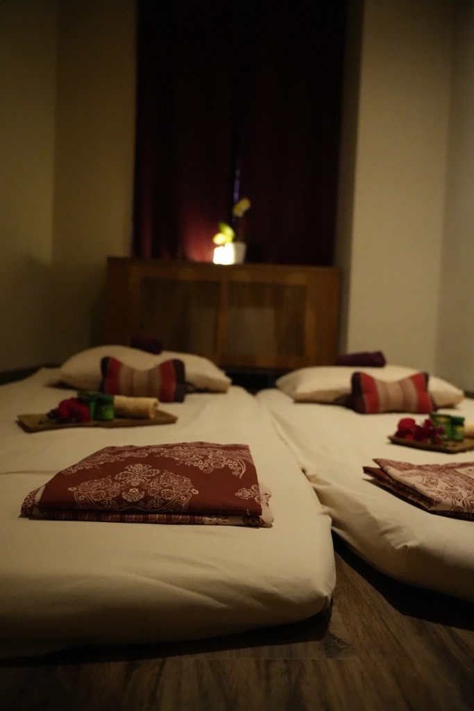 Clean and comfortable floor mat setup for authentic traditional Thai massage at Luxsa Thai Spa Manhattan